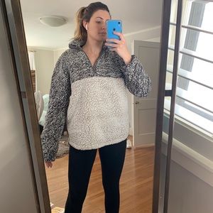 Two tone fuzzy quarter zip pull over